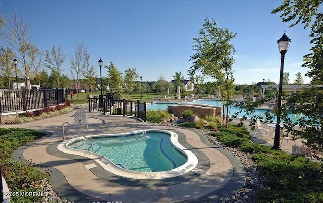 pool featuring fence