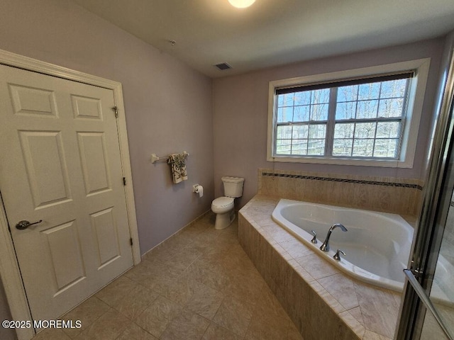 full bath featuring visible vents, toilet, and a bath