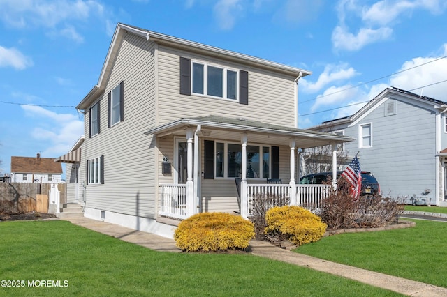 view of front of property featuring a porch and a front yard