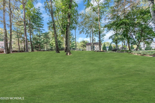 view of yard with fence