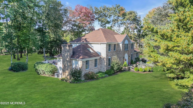 view of property exterior featuring a yard and a chimney