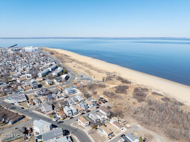 aerial view featuring a water view and a residential view