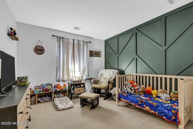 bedroom featuring visible vents and carpet floors