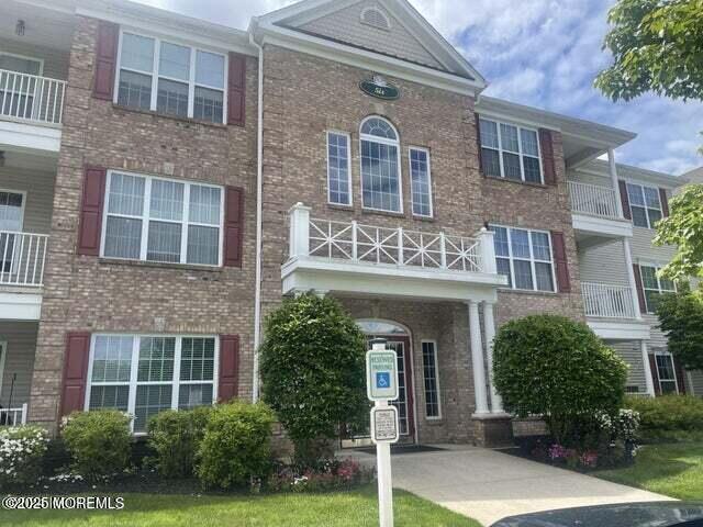 multi unit property featuring brick siding