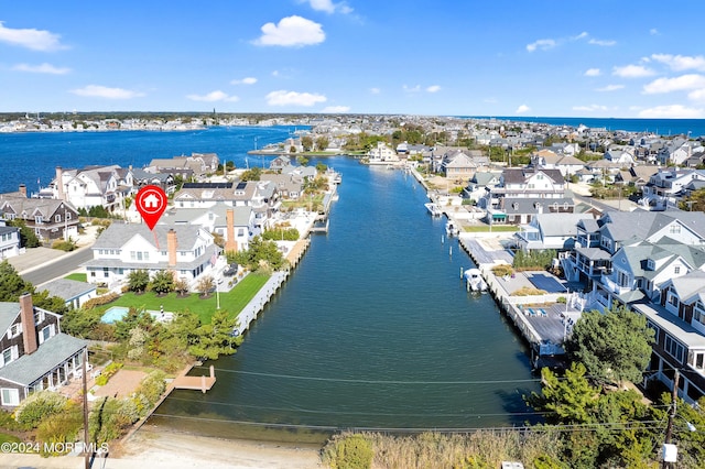 aerial view with a water view and a residential view