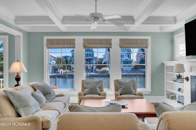 living room featuring coffered ceiling, a ceiling fan, and crown molding