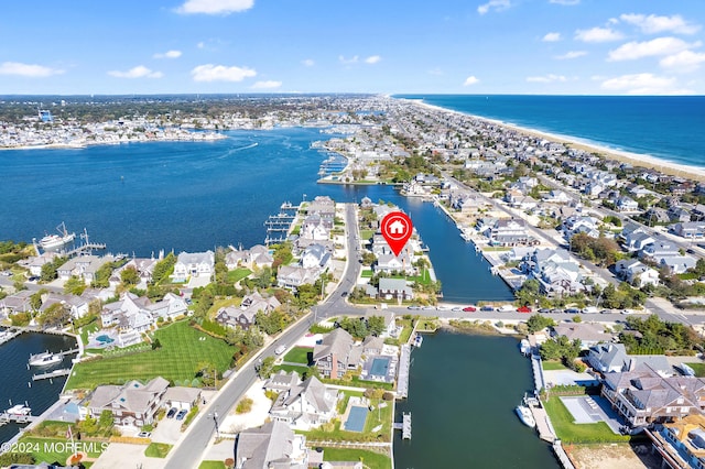 aerial view with a residential view and a water view