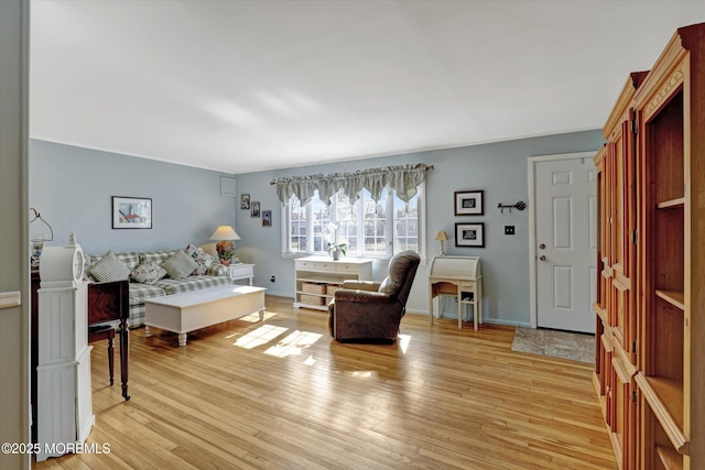 interior space with light wood-style floors and baseboards