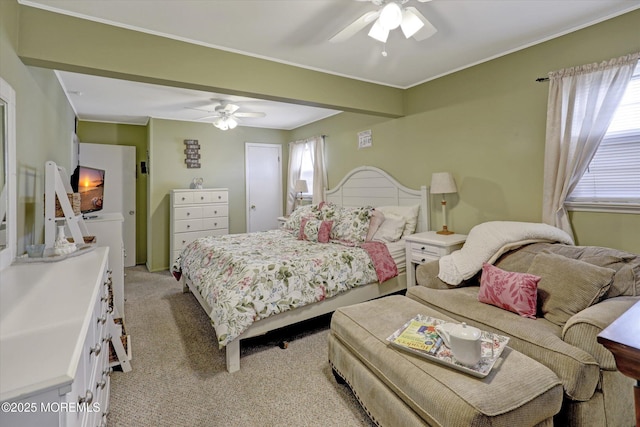 bedroom with light colored carpet and ceiling fan