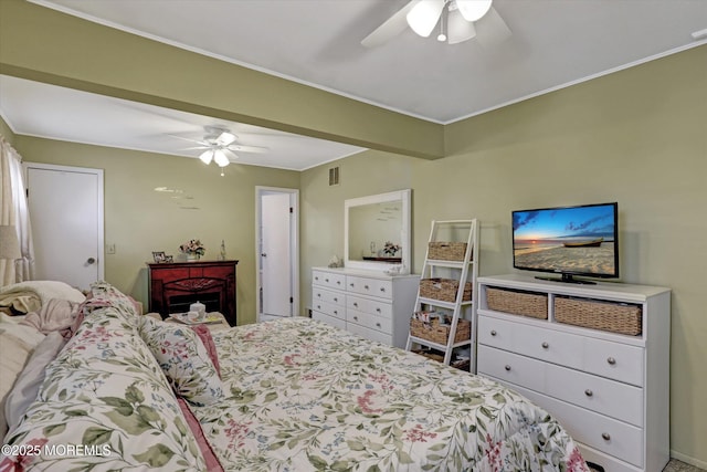 bedroom featuring visible vents and a ceiling fan