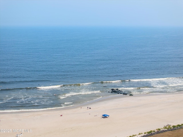 view of water feature featuring a view of the beach