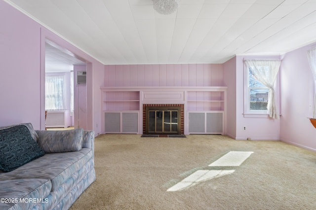 carpeted living area featuring plenty of natural light, cooling unit, a fireplace, and baseboards