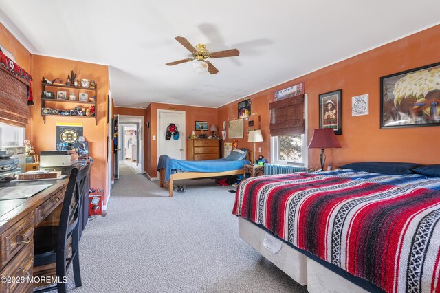 carpeted bedroom with a ceiling fan