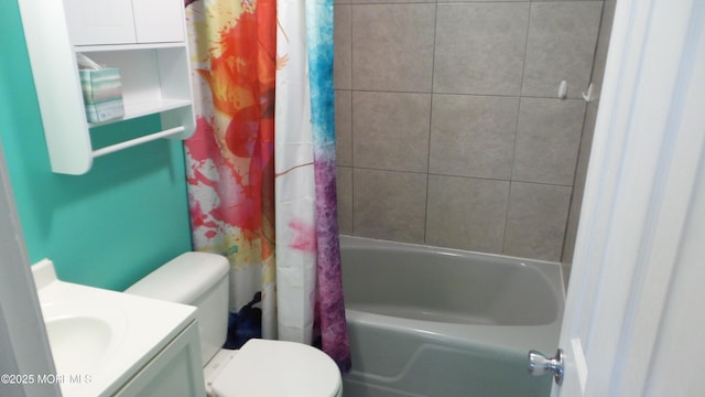 bathroom with vanity, toilet, and shower / bath combo with shower curtain