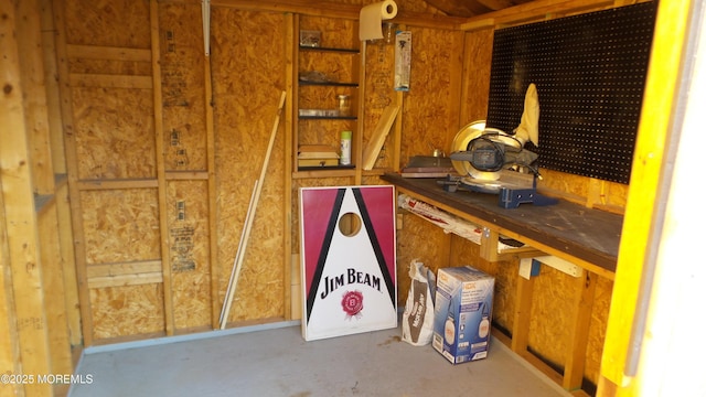 interior space featuring concrete flooring