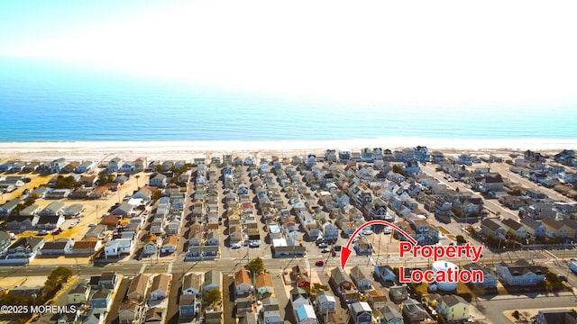 aerial view featuring a residential view and a beach view