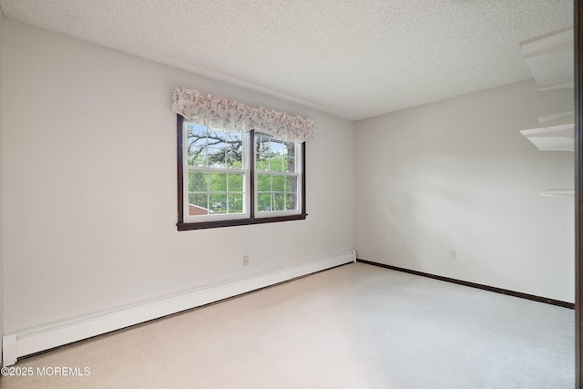 1 Hilltop Ct, Lanoka Harbor, NJ 08734 - carpeted empty room featuring baseboard heating, a textured ceiling, and baseboards