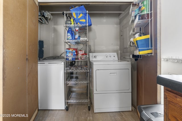 laundry area with washing machine and dryer and laundry area