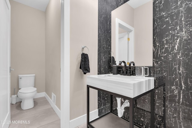 71 Broadway Ave, Lakewood, NJ 08701 - bathroom featuring vanity, toilet, baseboards, and visible vents