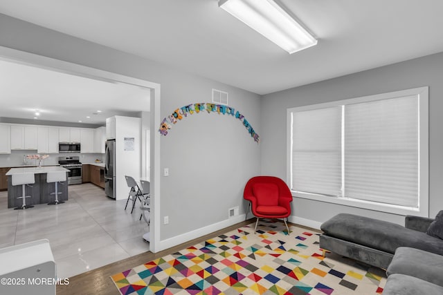 71 Broadway Ave, Lakewood, NJ 08701 - recreation room with visible vents, baseboards, light wood-style flooring, and recessed lighting