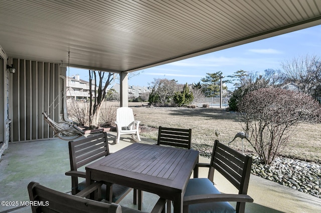 view of patio featuring outdoor dining space