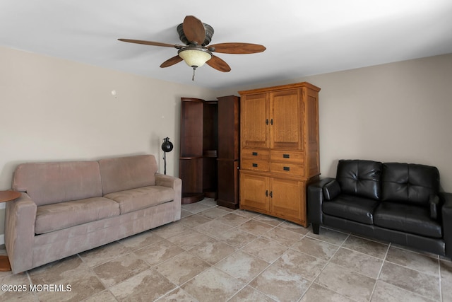 living area featuring a ceiling fan