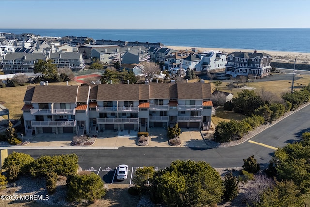 aerial view with a residential view and a water view