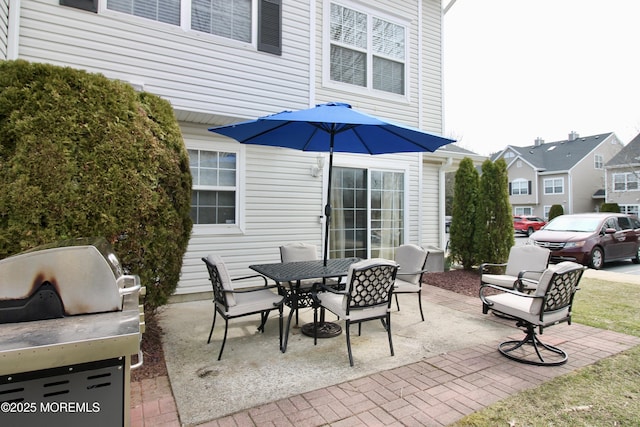 view of patio / terrace with outdoor dining area and area for grilling