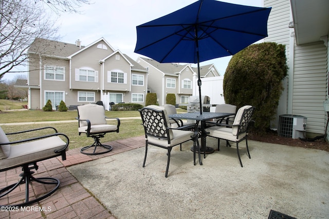 view of patio / terrace featuring outdoor dining area and central AC