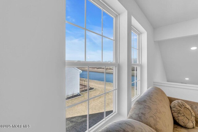 interior space featuring a water view