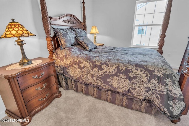 bedroom featuring carpet