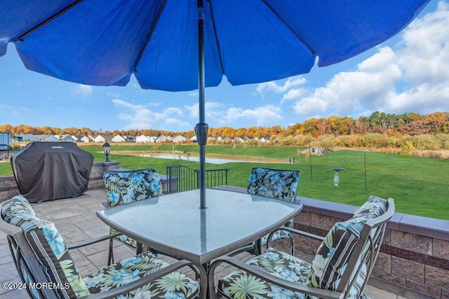 view of patio with a grill