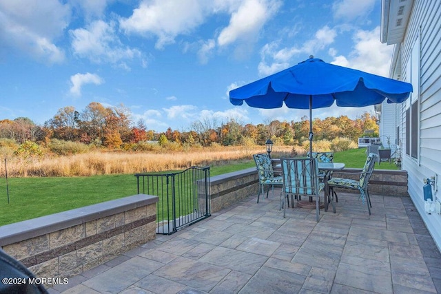 view of patio with outdoor dining area
