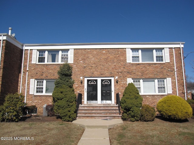 view of front of property with brick siding