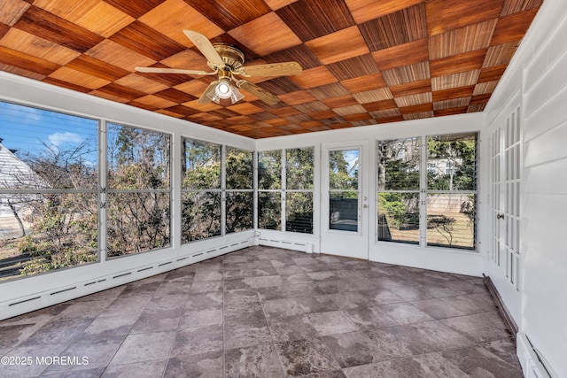 unfurnished sunroom with a baseboard heating unit, wood ceiling, a baseboard radiator, and a ceiling fan