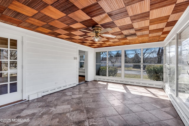 unfurnished sunroom with wooden ceiling, a healthy amount of sunlight, and a baseboard radiator