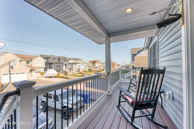 balcony featuring a residential view