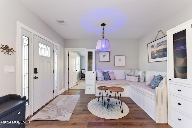 entryway with visible vents and dark wood-style flooring