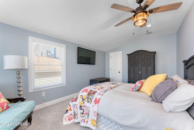 bedroom featuring visible vents, ceiling fan, baseboards, lofted ceiling, and carpet floors