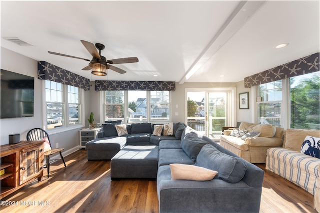 living area with visible vents, a ceiling fan, wood finished floors, recessed lighting, and baseboards