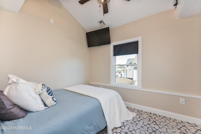 carpeted bedroom featuring a ceiling fan, lofted ceiling, baseboards, and visible vents