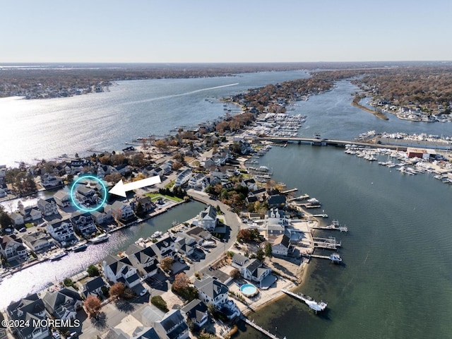 drone / aerial view with a water view