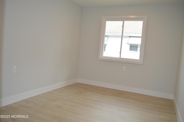 71 Montserrat St, Toms River, NJ 08757 - unfurnished room with baseboards and light wood-style flooring