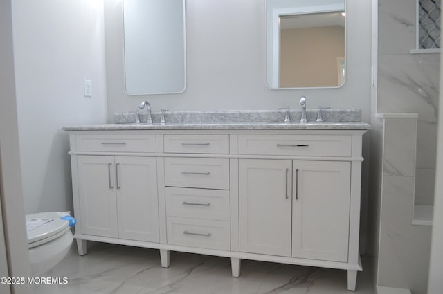 71 Montserrat St, Toms River, NJ 08757 - full bath with marble look tiles, toilet, and double vanity