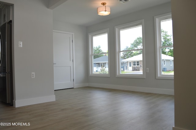 71 Montserrat St, Toms River, NJ 08757 - unfurnished dining area with wood finished floors and baseboards