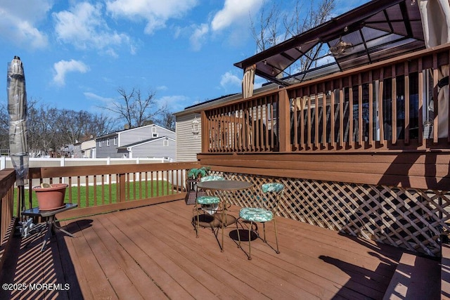 wooden deck featuring fence