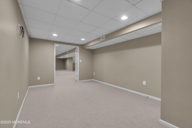 finished basement with recessed lighting, visible vents, baseboards, and carpet