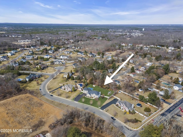 drone / aerial view with a residential view