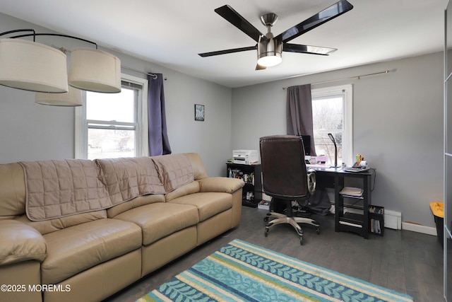 office area with ceiling fan, baseboards, and wood finished floors