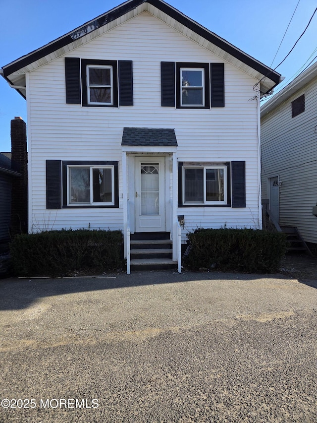 traditional home with entry steps